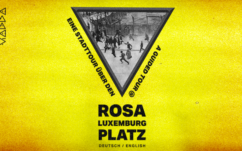 Foto mit Personen, die über den Rosa-Luxemburg-Platz laufen