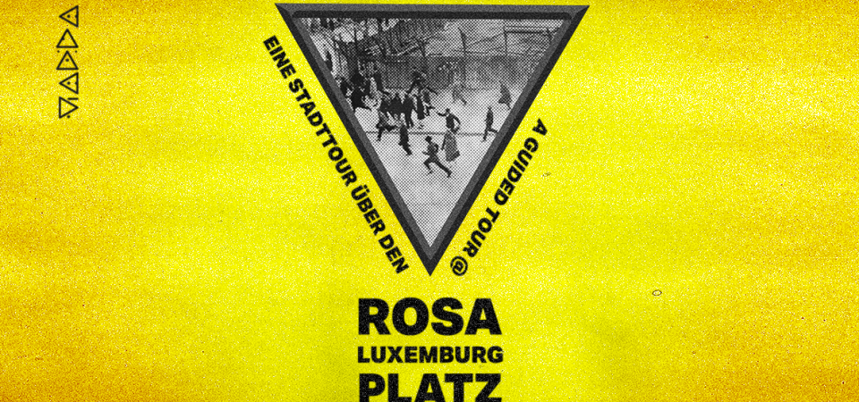 Foto mit Personen, die über den Rosa-Luxemburg-Platz laufen 